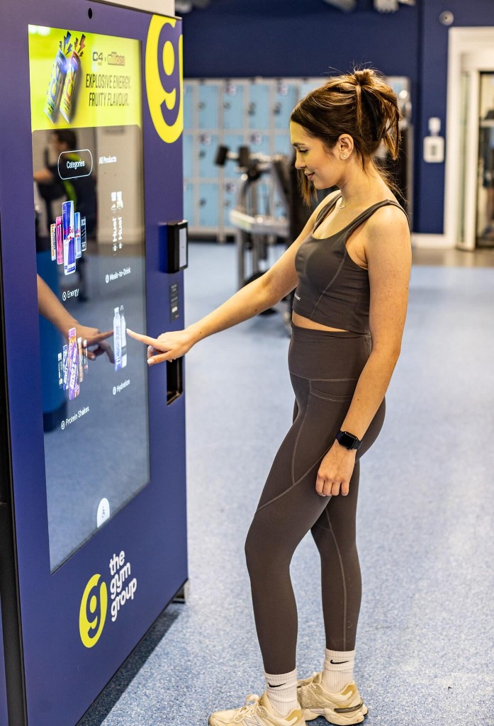 High-footfall gym environment with digital screens